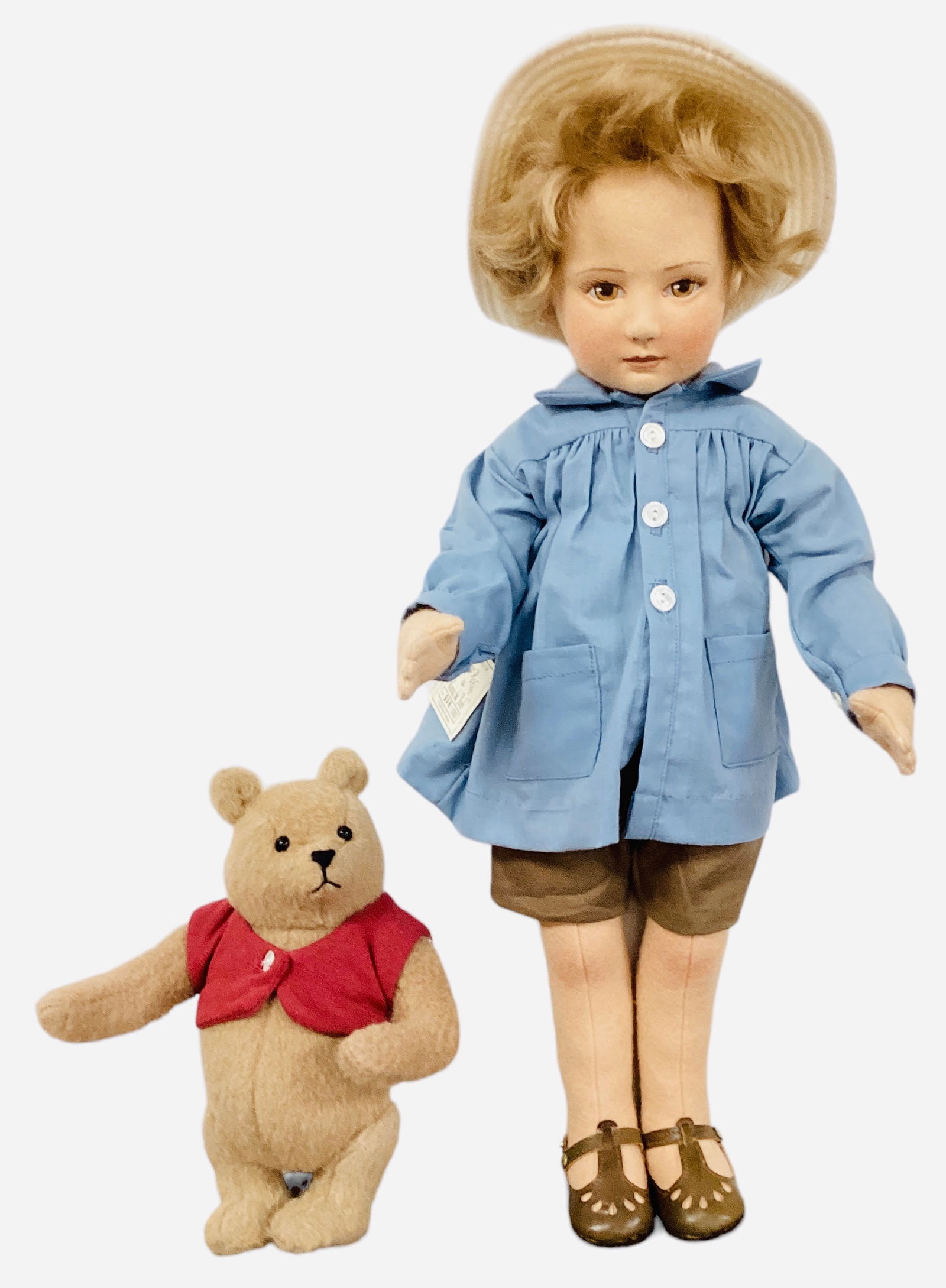 R. John Wright 1st issue "Christopher Robin and Winnie the Pooh".: R. John Wright 1st issue "Christopher Robin and Winnie the Pooh". Includes 18 1/2" Christopher Robin and 8" Winnie the Pooh. Christopher Robin is an all wool felt doll with molded and painted facial f