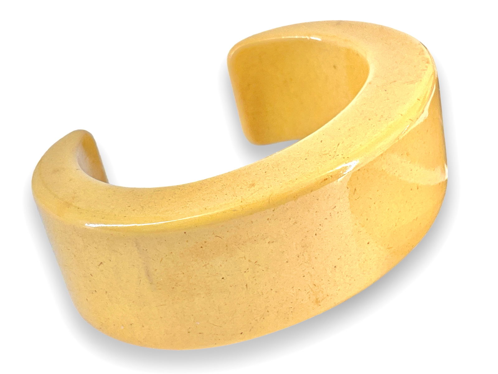 Vintage Bakelite Cuff: Vintage Bakelite Cuff 2.25" interior diameter, 24.5mm in width, yellow body color, tested bakelite composition.