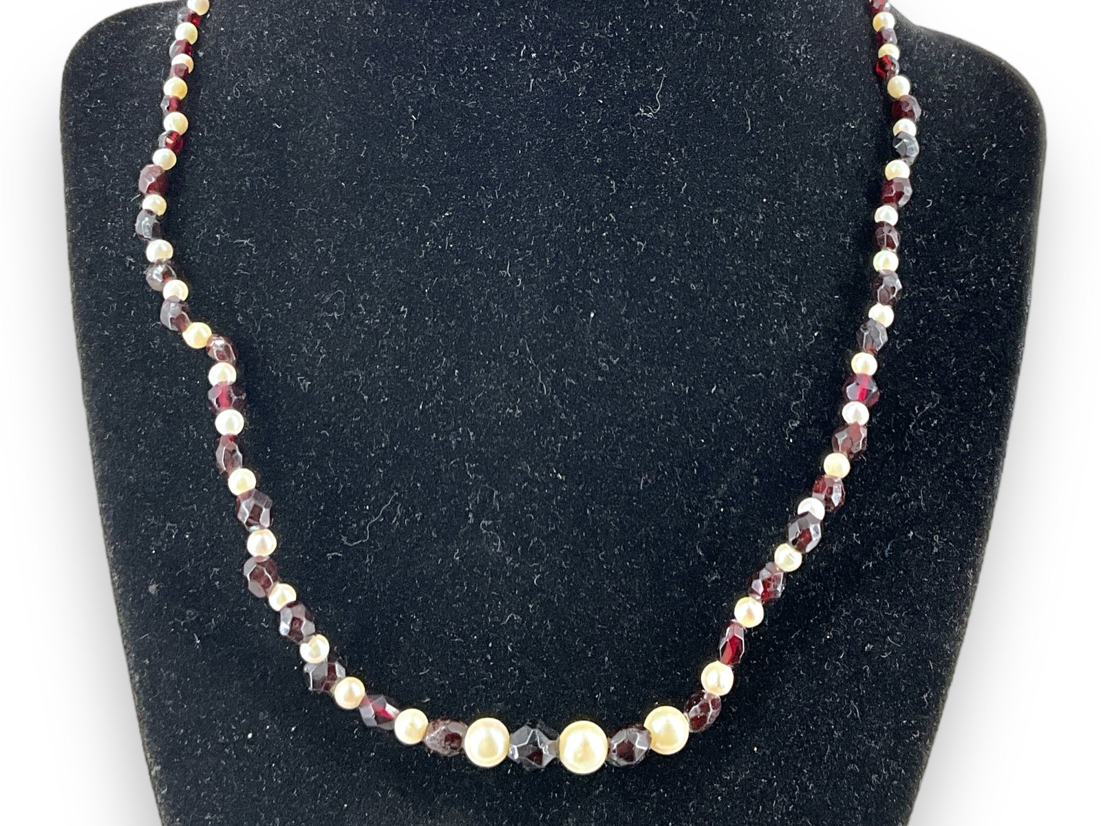 Pearl and Garnet Stone Necklace: Pearl and Garnet Stone Necklace 17" princess length necklace with graduated size pearls and faceted garnet stones measuring up to 6.75mm in size, cultured pearl rounds (off-white color, good luster, s