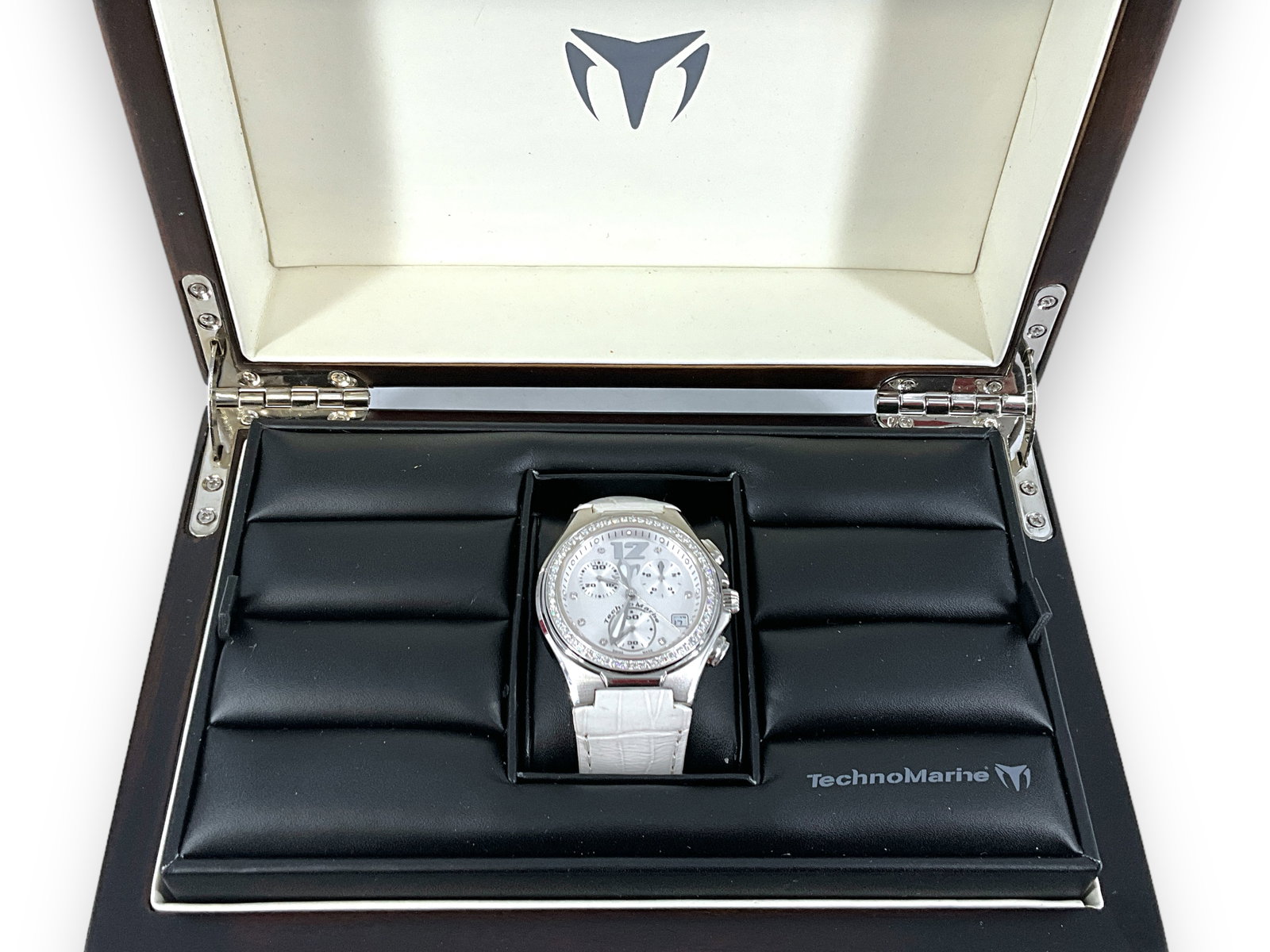 Technomarine Wrist Watch Chronograph with Diamonds in Original Box: Technomarine Wrist Watch Chronograph with Diamonds in Original Box Modern design, like-new condition, 30.75mm textured off-white dial, three sub-dials on face, date window at 4 o' clock position, all