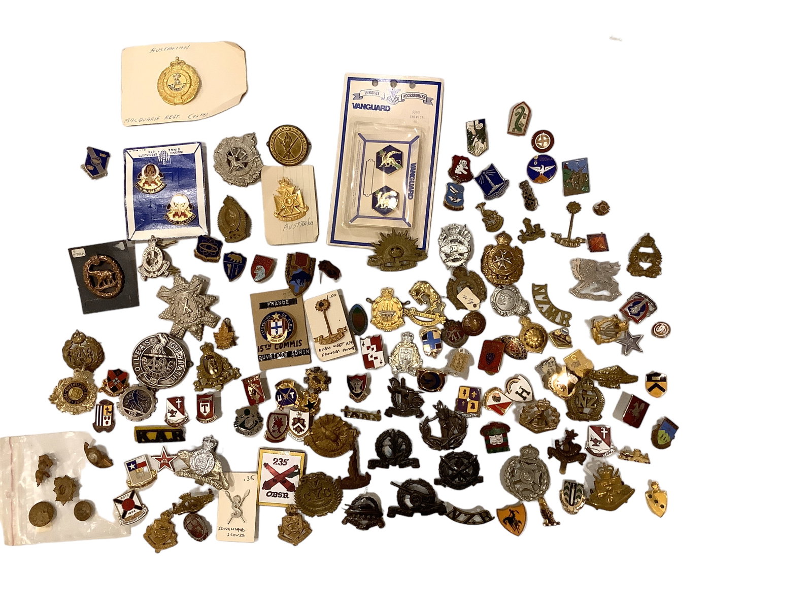Military Insignias and Medals: Military Insignias and Medals Many are Australian, also some French, Israeli, British, South African and possibly others. Some with pin backs.