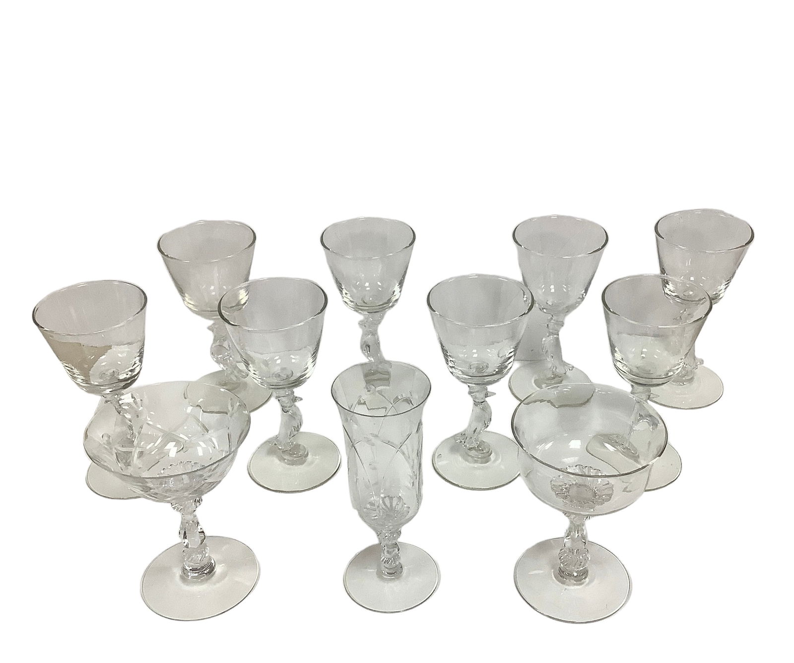 (11) Assorted Pieces of Vintage Stemware: (11) Assorted Pieces of Vintage Stemware(8) Old Crow Whiskey cocktail glasses, 5 3/4". (1) etched, 6" H, stemmed glass. (1) etched, 5" H, stemmed champagne glass. (1) stemmed, 5", champagne glass.*SHI