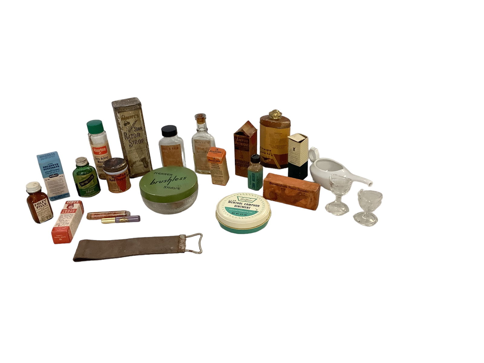 Vintage Toiletry Product Bottles & Cans: Vintage Toiletry Product Bottles & CansIncludes razor strap, eye wash cups, camphor ointment, Absorbine Jr., Foley pills, Dent's tooth drops and others as pictured. (23) items total.