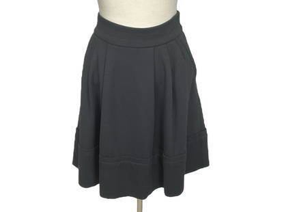 Flirty Black Knit Skirt by "Marc Jacobs": Flirty Black Knit Skirt by "Marc Jacobs"Skirt has the tag "Marc by Marc Jacobs" and is a size Medium, is made of Rayon, Nylon and Spandex and dry-cleaning is recommended. Skirt has a pleated flair des