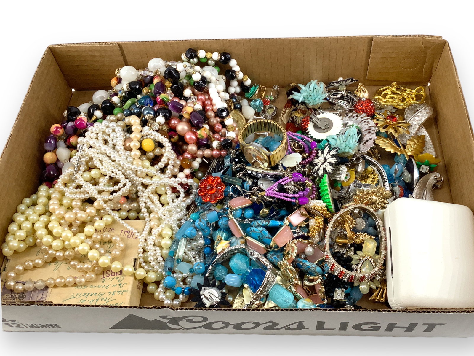 Assortment of Fashion and Costume Jewelry & Accessories: Assortment of Fashion and Costume Jewelry & Accessories Faux pearl necklaces, wrist watches from manufacturers including Kronairon and Wrangler, figural pheasant pin, vintage pins/brooches with floral