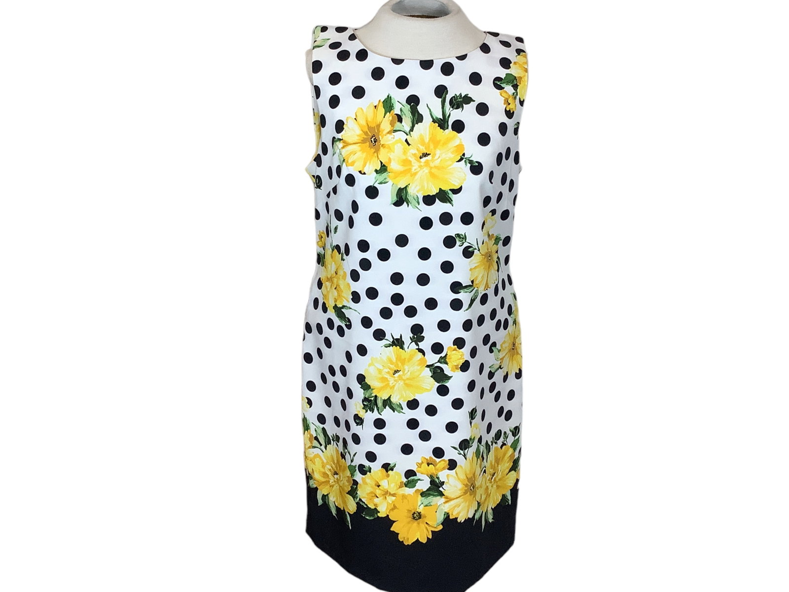 New Sunflowers and Polka Dots Dress: New Sunflowers and Polka Dots Dress Knee length sleeveless dress by Alyx. White dress with black polka dots and sunflowers. Zipper back, size 8, made in Vietnam. Great for a summer brunch or baby show