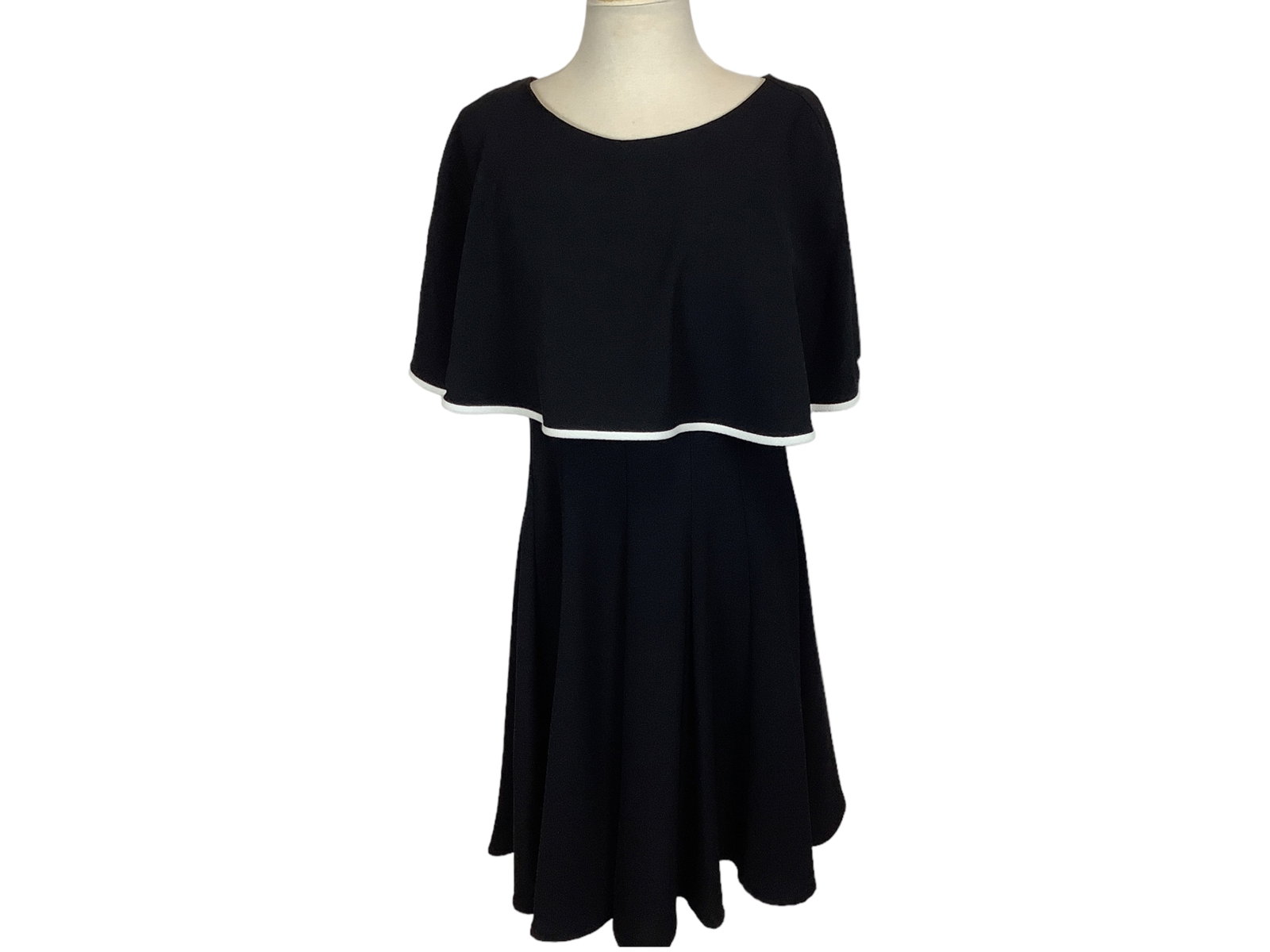 New Short Sleeve Shawl Dress: New Short Sleeve Shawl Dress Black dress with ivory accents by Danny and Nicole. Knee length shawled short sleeve dress with zipper back. Size 8, made in Vietnam. Good to wear for a somber event.