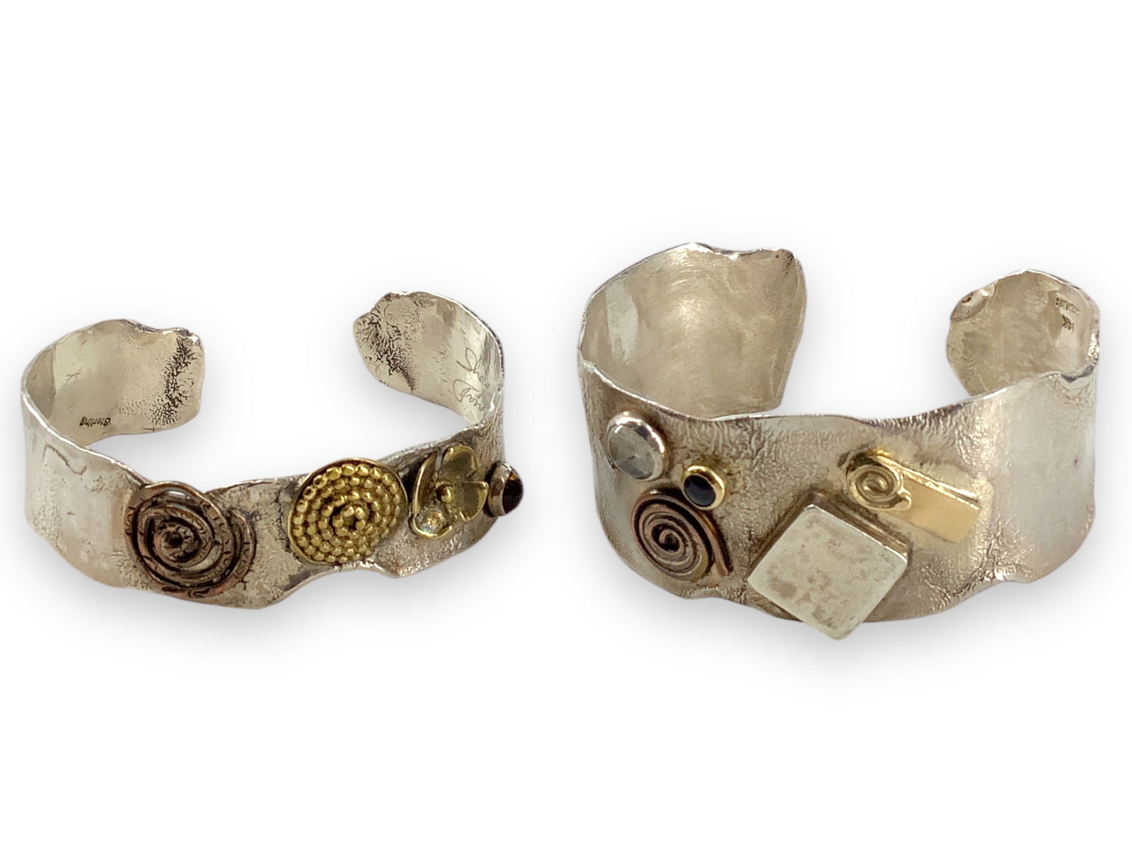 Silver Hand-Made Bracelets by Sherry Tinsman: Silver Hand-Made Bracelets by Sherry TinsmanSherry Tinsman is the artist of these two cuff bracelets. The first is a modern design @ approx 1" wide, is signed by the designer and marked "Sterling 14K.