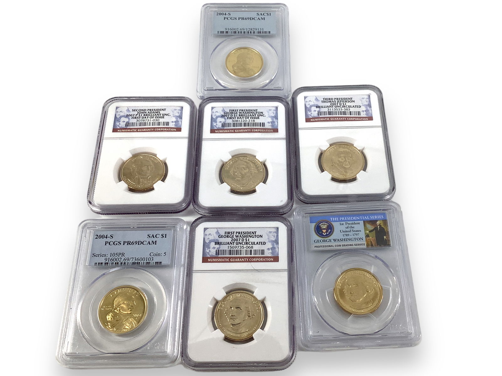 Seven Modern U.S. $1.00 Coins in Slabs (1 of 2)