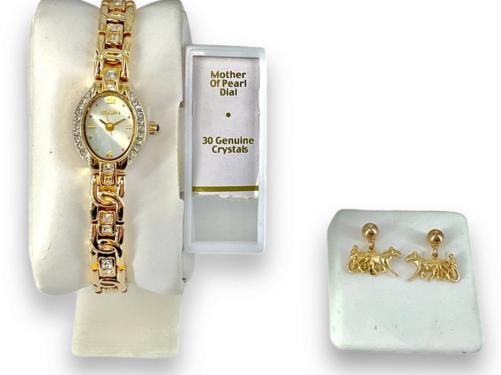 Never Worn Elgin Ladies Watch and Gold-Filled Equestrian Earrings: Never Worn Elgin Ladies Watch and Gold-Filled Equestrian Earrings Elgin watch is in "as new" condition, has gold-tone metal with crystal accents, has a mother-of-pearl dial and retains the original st