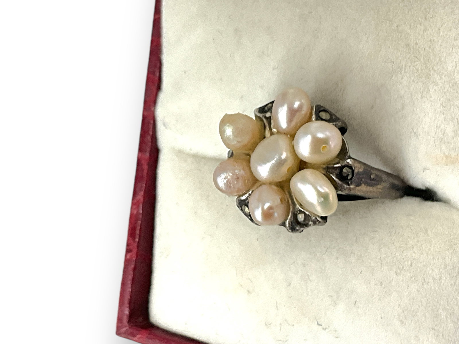 Sterling Silver and Pearls Ring: Sterling Silver and Pearls Ring Stamped and tested sterling silver/925, 0.14 troy ounces total weight, size 5, with cultured pearls measuring up to 5.0mm, accented with small marcasite stones.