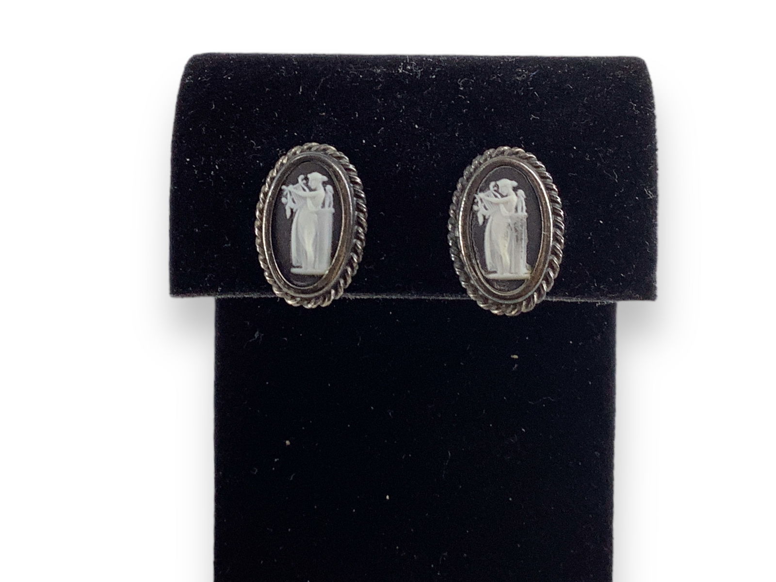 Sterling Silver Cameo Earrings: Sterling Silver Cameo EarringsPair of antique screw-back earrings, sterling silver - approximately 0.135 troy ounces total weight, 18.0mm in size, figural woman playing lyre designs.