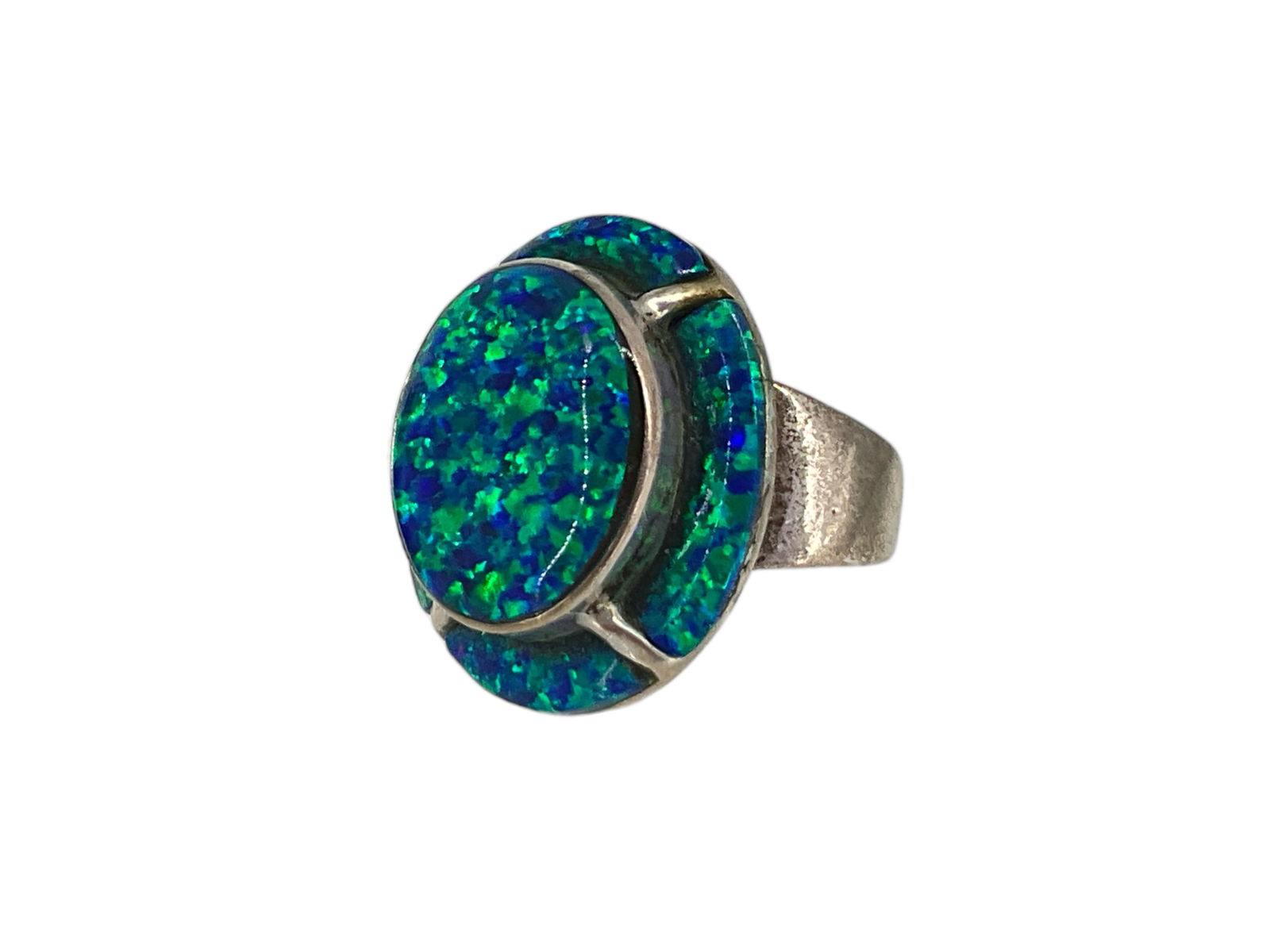 Sterling Silver and Synthetic Opal Ring: Sterling Silver and Synthetic Opal RingStamped and tested sterling silver/925, signed OTT, 0.305 troy ounces total weight, size 5.5 with tapered shank, 22.25mm mounting with synthetic opal stone inlay