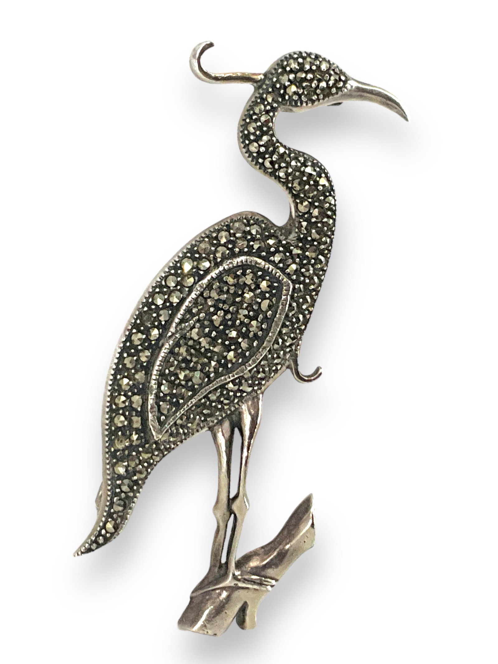 Sterling Silver Heron Pin: Sterling Silver Heron Pin Stamped and tested 925/sterling silver, 3.125" in length, 0.675 troy ounces total weight, set with marcasite stone adornments.
