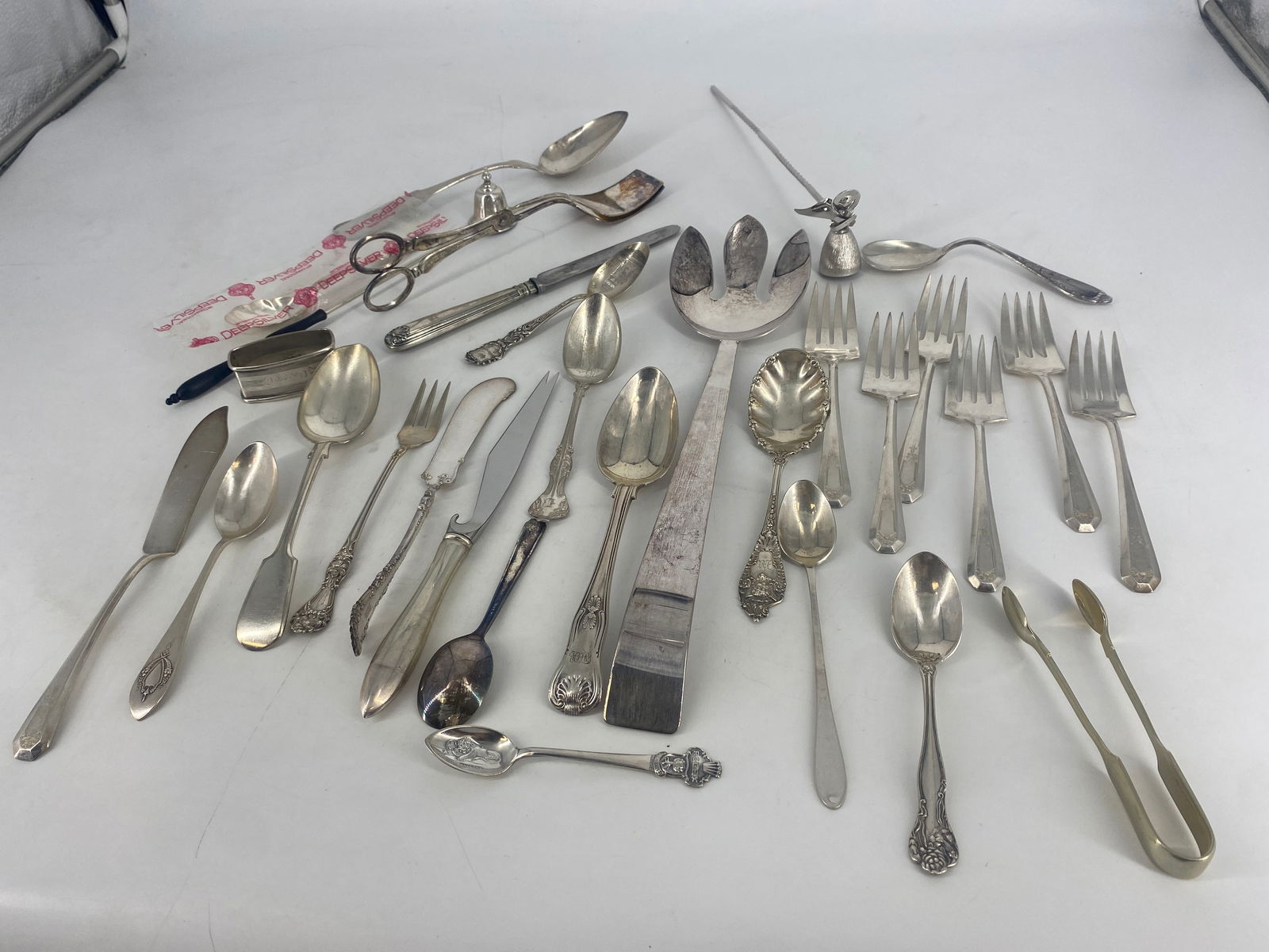 Sterling Silver and Silver-Plated Flatware and Serveware: Sterling Silver and Silver-Plated Flatware and ServewareFrom manufacturers including Gorham, International, and Rogers. Seven sterling silver spoons and one sterling silver napkin ring. Sterling silve