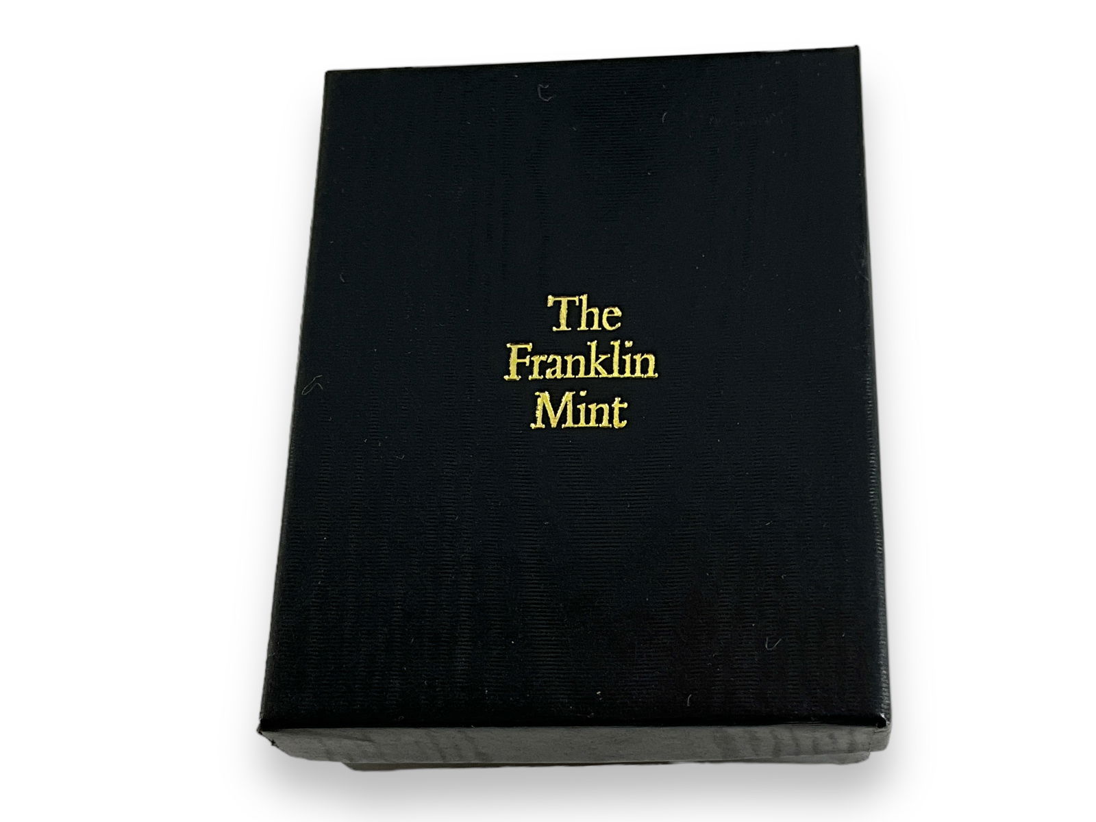 "The Golden Caribbean Earrings" from The Franklin Mint: "The Golden Caribbean Earrings" from The Franklin MintMeasuring approx. (1.53" x 0.95") clip on earrings in the original box with COA.