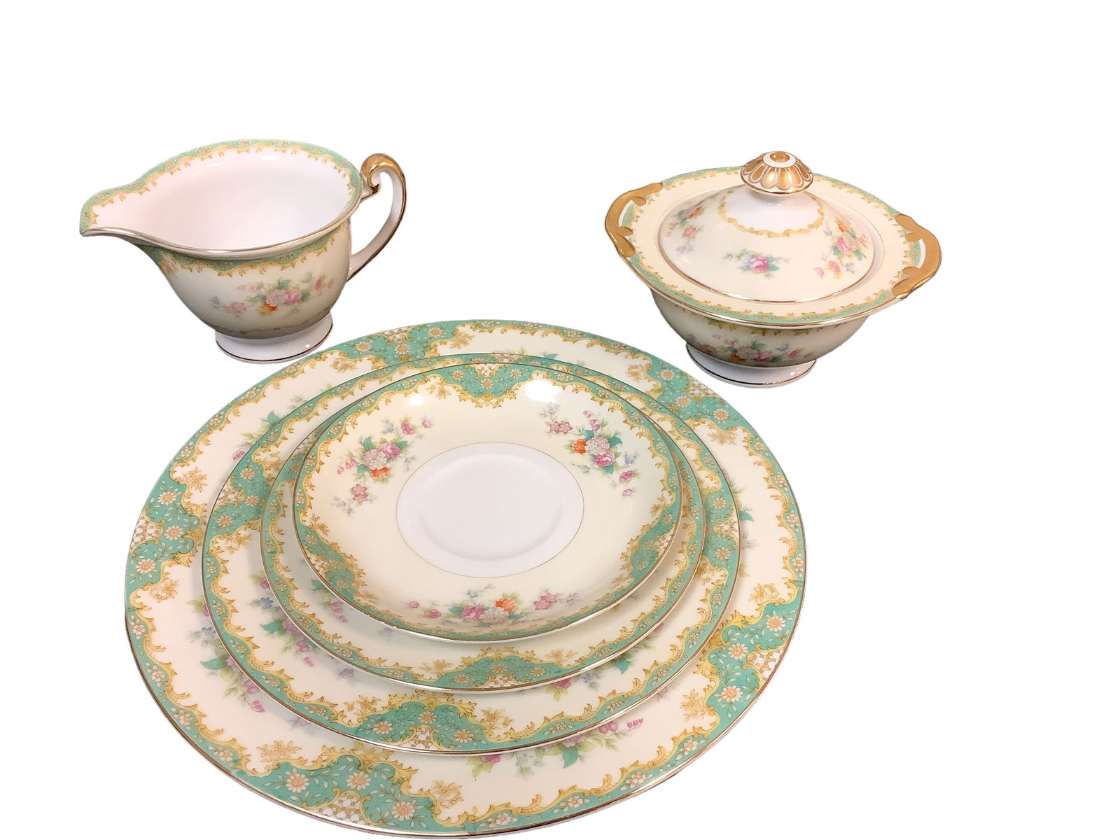 Orion Made in Japan (74) Pieces ***No In-House Shipping***: Orion Made in Japan (74) Pieces ***No In-House Shipping***Beautiful pink and green floral pattern with gold trim.Dinner plates 11; Salad plate 12; Bread and butter plate 12; Saucer 12; Sauce bowl 12;