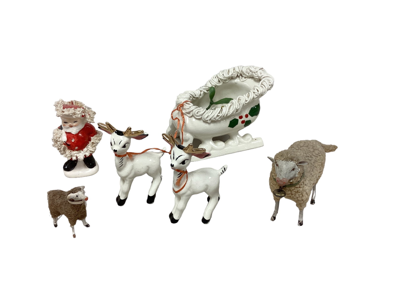 Possibly German Putz Woolly Sheep and Napco Pepper Shaker: Santa Sleigh Planter & Reindeer Figurines JapanGerman Putz Woolly Sheep green Collar and Bell Stick Leg (2 1/4" and 4" tall)Napco Mr & Mrs Santa Claus Christmas pepper shaker