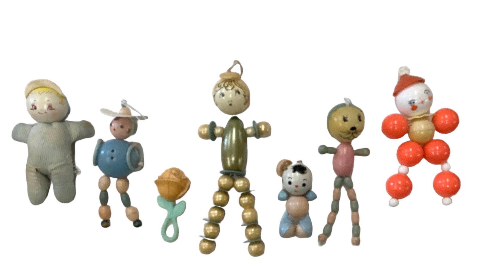 Vintage Baby Rattles: Vintage Baby Rattles (7) plastic and wooden rattles, ranging in length from 5"-12".