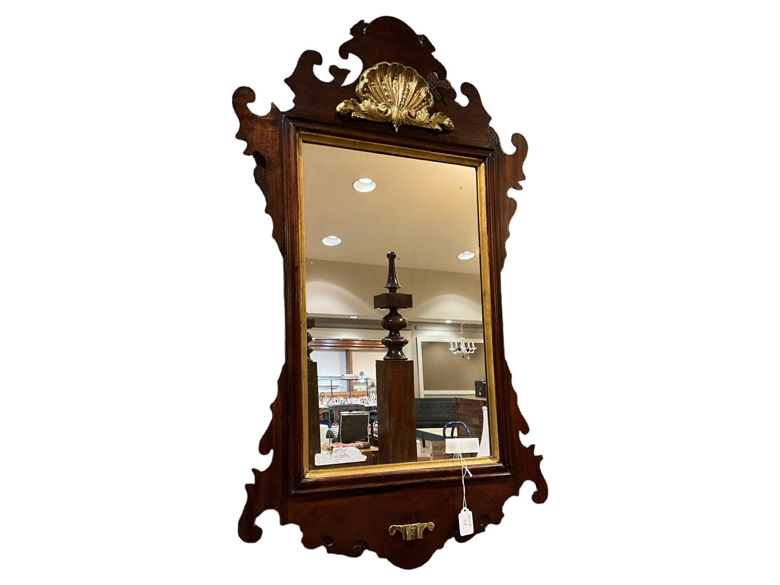 Reproduction Chippendale Style Mirror: Reproduction Chippendale Style MirrorThis is a reproduction of a Chippendale style mirror. The mirror is made in the style of Thomas Chippendale, an 18th-century English furniture maker and designer.