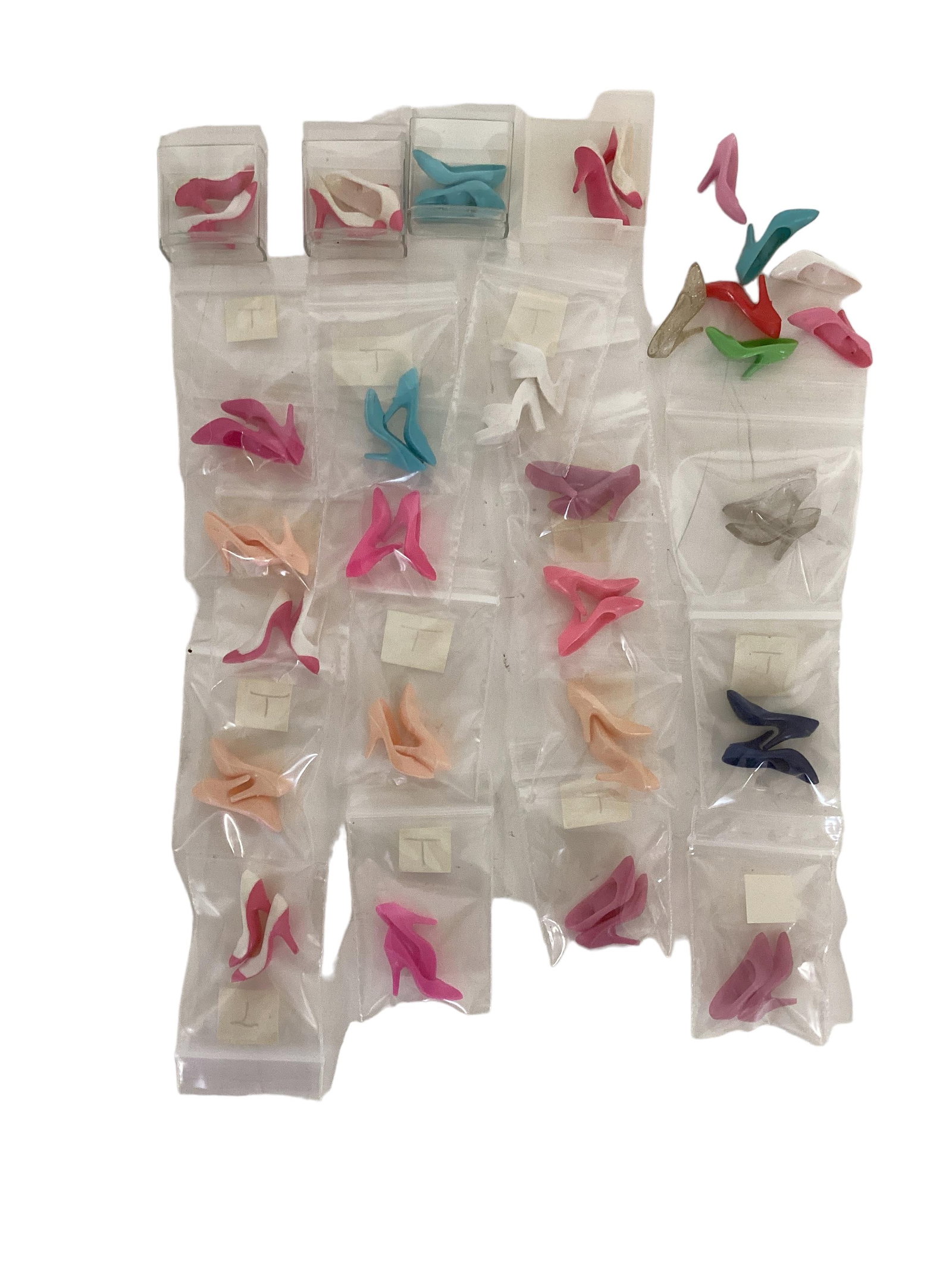 21 Pairs & 7 Single Shoes for Newer Barbie's: 21 Pairs & 7 Single Shoes for Newer Barbie's Close toe high heels, these will Not fit vintage Barbie's. Please see 2nd picture for size reference ( larger pink shoe not in this lot).