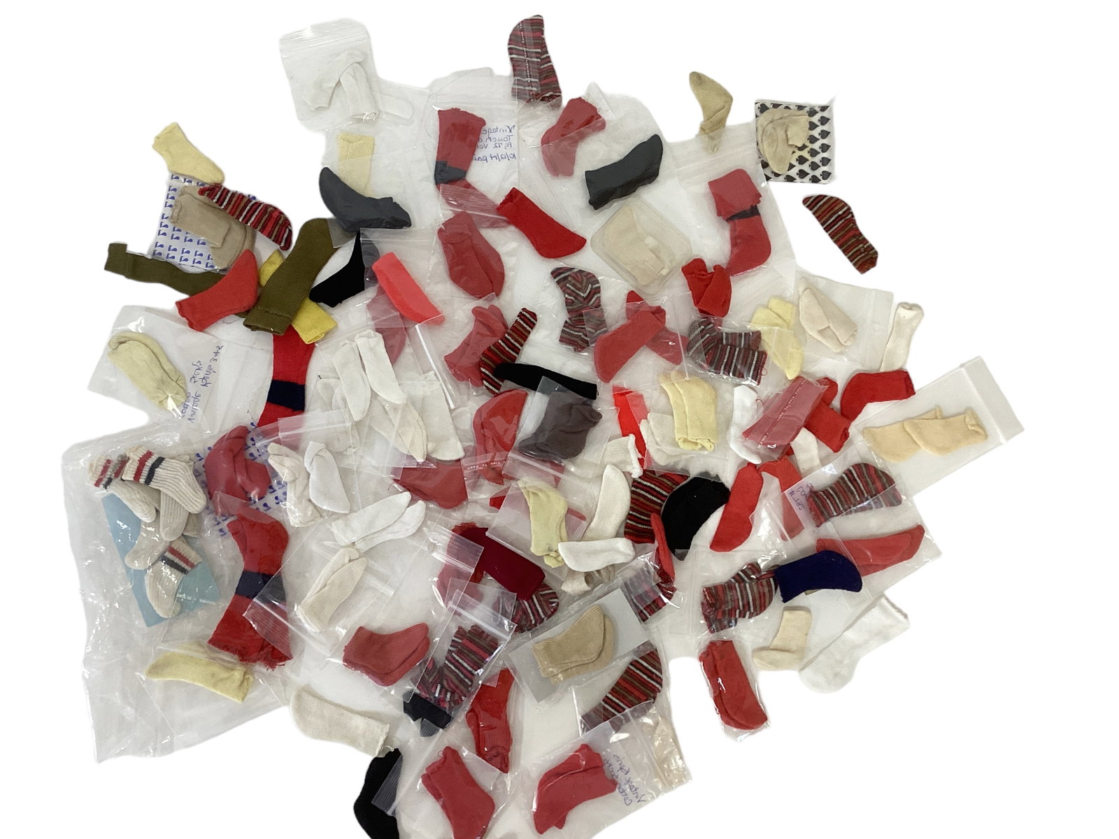 Over 30 Pairs of Vintage Ken Socks: Over 30 Pairs of Vintage Ken Socks Red, striped, white, black, more.