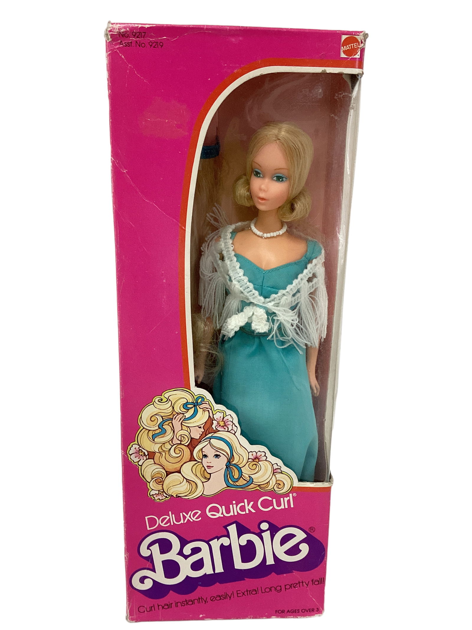 Fantastic Deluxe Quick Curl Barbie MIB & NRFB: Fantastic Deluxe Quick Curl Barbie MIB & NRFBDeluxe Quick Curl Barbie in a 1975 Pink Box. Barbie is in a pretty blue dress & shawl and includes bruh, comb, curler, 2 ribbons, 2 bobby pins, and hairpie