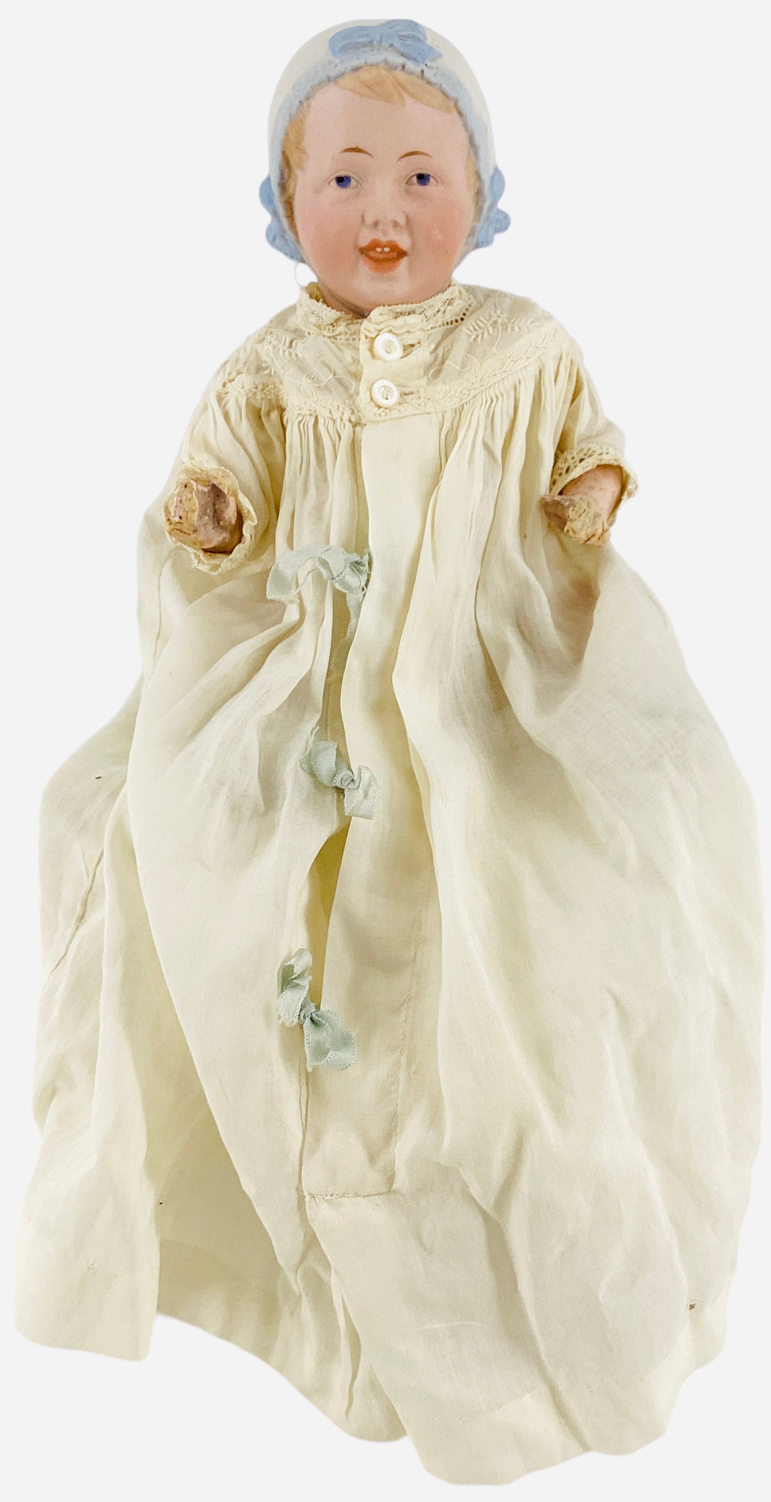 Recknagel 22 Bisque Socket Head Bonnet Baby: Recknagel 22 Bisque Socket Head Bonnet Baby9 1/2" doll with molded and painted bonnet, hair and facial features, intaglio eyes, open/closed mouth with molded and painted upper teeth, on five-piec