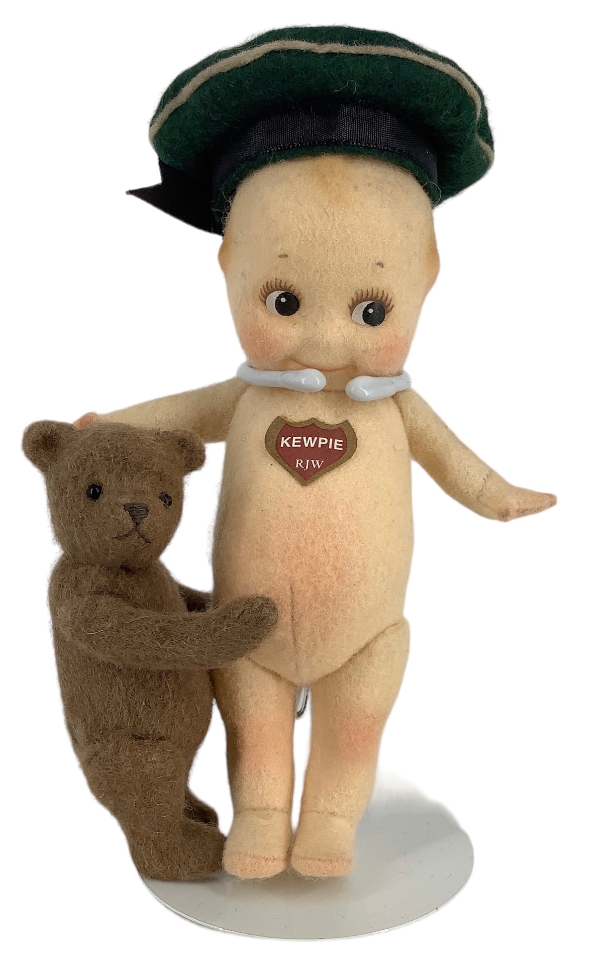 R. John Wright "Kewpie & Teddy": R. John Wright "Kewpie & Teddy"6 1/2" molded and painted wool felt Kewpie with disk jointed head, arms and legs, and 3 3/4" wool felt Teddy also disk jointed at the neck, shoulders