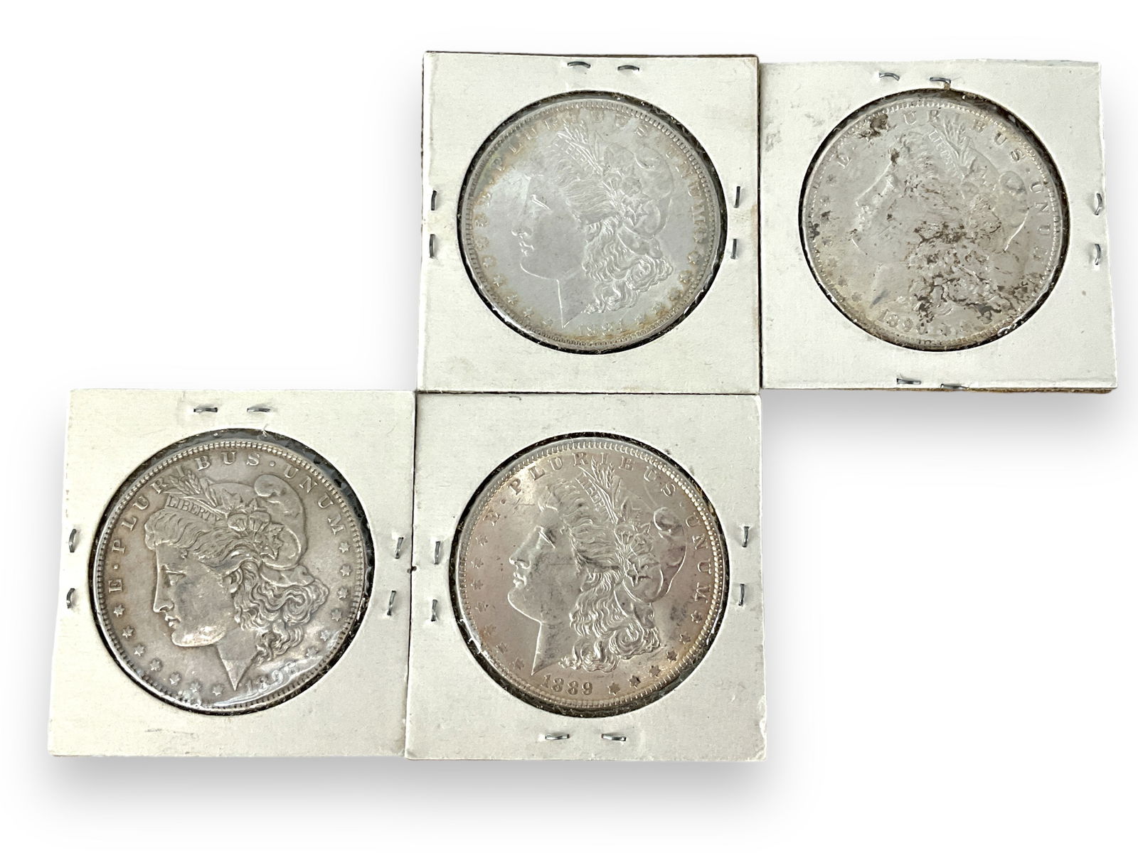 Four U.S. Morgan Silver Dollar Coins (1 of 3)