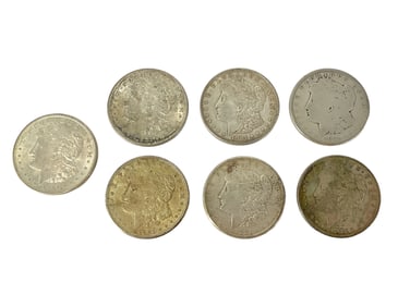 Seven Morgan Silver Dollar Coins