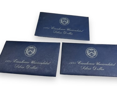 Three Eisenhower Silver Dollar Coins