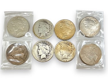 Eight U.S. Silver Peace Dollar Coins