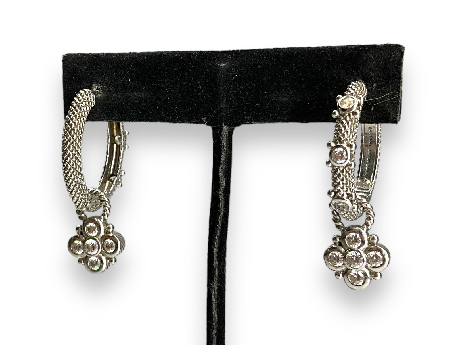 Sterling Silver Judith Ripka Hoop Earrings: Sterling Silver Judith Ripka Hoop EarringsHinged closures measuring (1.48") in length with optional charm dangles, stamped tested and signed (0.38 troy oz tw).