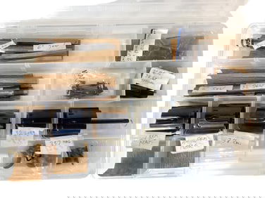 Case with Smith & Wesson Cylinders and Misc. Small Parts