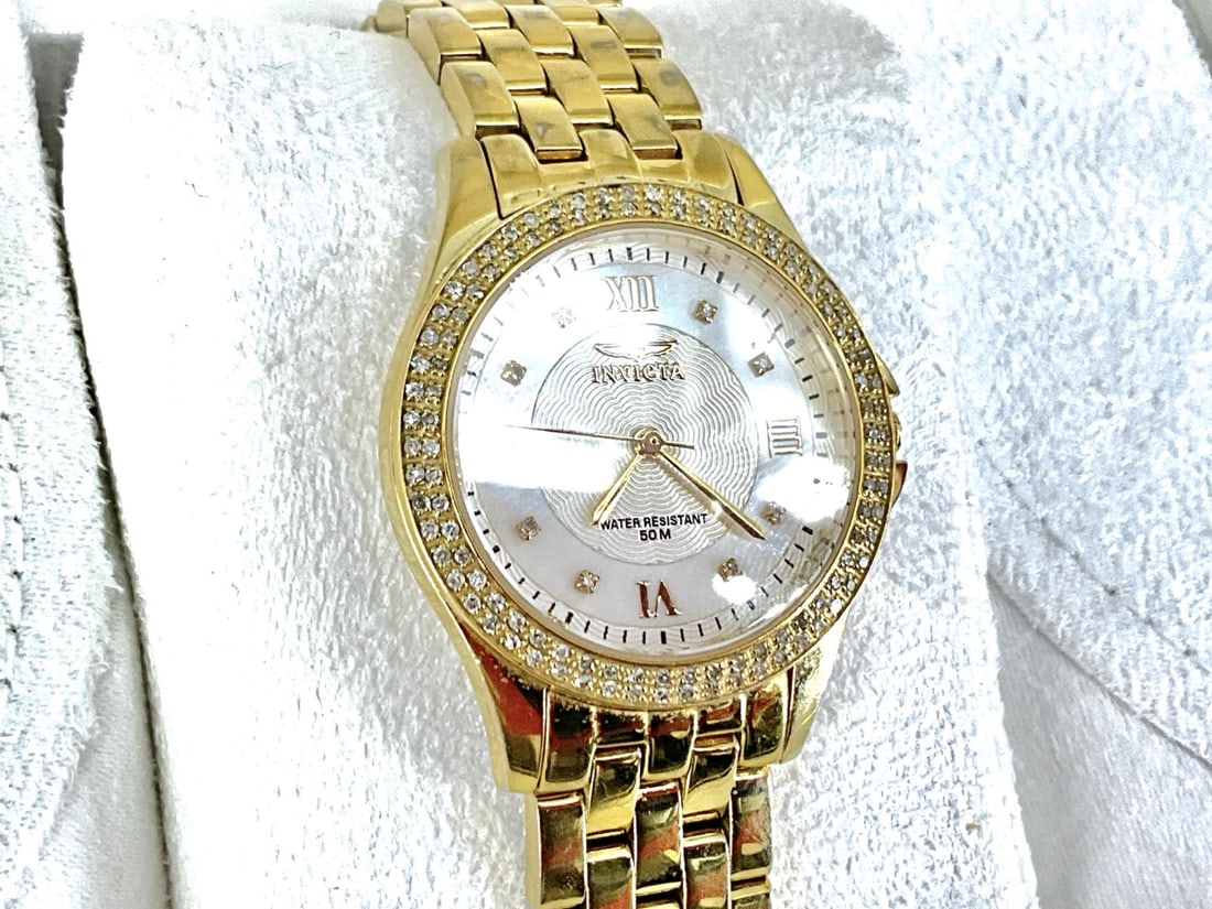 Ladies Gold-Tone "Invicta" Brand Diamond Watch in Original Box: Ladies Gold-Tone "Invicta" Brand Diamond Watch in Original BoxLadies gold-tone watch retains the original box and papers, back of watch reads, "Limited Edition Model No 3345, All Stainless Steel, Wate