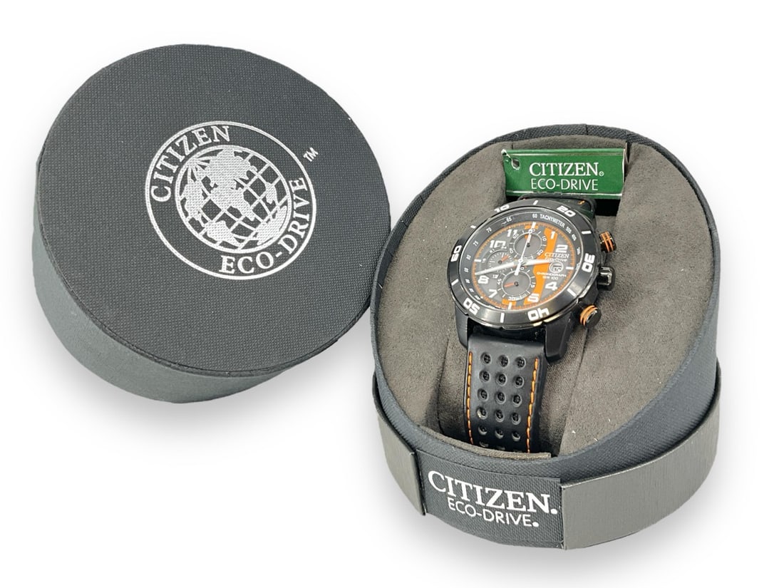 Citizen Ego-Drive Wrist Watch In Box: Citizen Ego-Drive Wrist Watch In BoxGently used condition with orange and black face, black and orange band, chronograph.