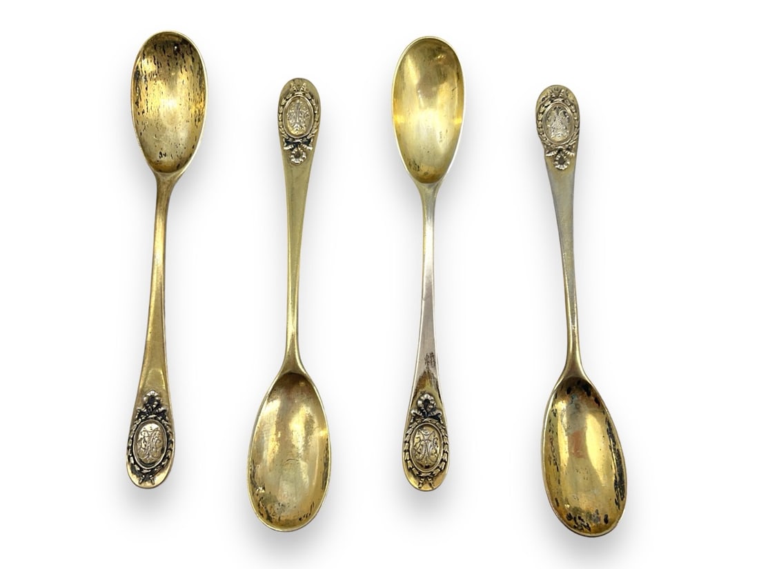 Lovely Silver Spoons w/Gold Wash: Lovely Silver Spoons w/Gold Wash Lot contains four lovely spoons which test 76 parts silver with a gold overlay. Spoons are 5 1/2" long and are marked on the reverse, "M 800 GP." The ends of the spoon