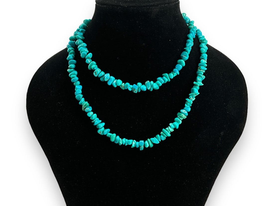 Turquoise Chip Strand Necklace: Turquoise Chip Strand Necklace 29" in length, approximately 8.0mm in width, hook clasp closure, with tumbled/polished turquoise stone beading.
