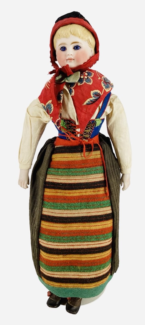 Kling bisque shoulder head girl.: Kling bisque shoulder head girl.All original 15 1/2" doll with molded and painted hair and facial features, inset glass eyes, closed mouth, stitch-jointed cloth body with bisque lower arms, dress