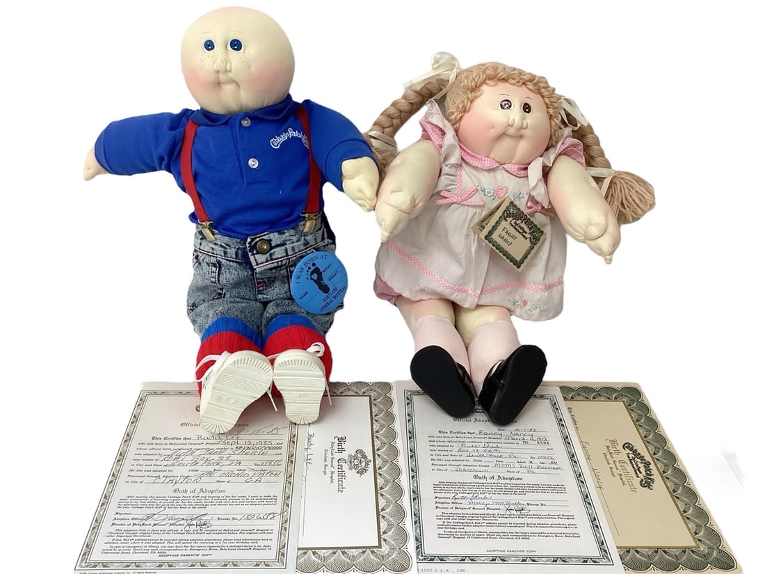 2 Xavier Roberts Original Cabbage Patch Kids 1983 & 1985: 2 Xavier Roberts Original Cabbage Patch Kids 1983 & 1985Original soft sculpture dolls. Fanny Nancy has complete paperwork, paper name tag, side tags, stamped signature. Her # is 0508. Rudy Lee has com