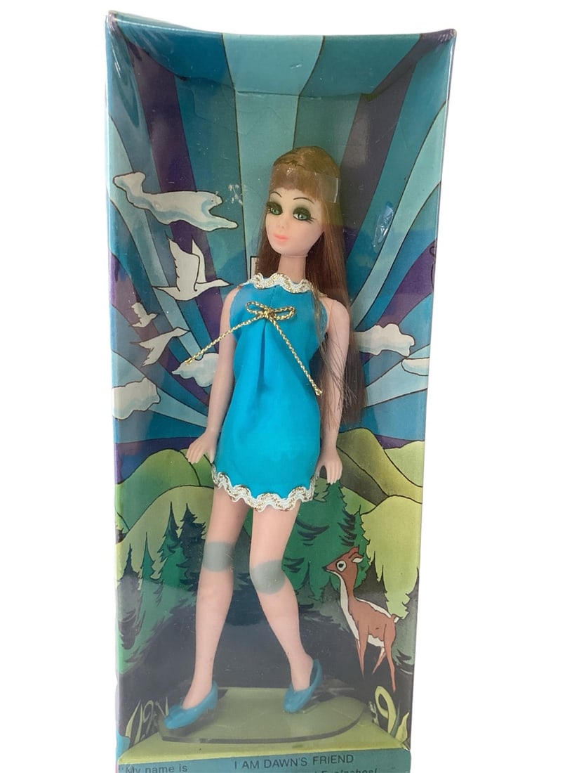 Glori Doll NRFB: Glori Doll NRFB (1) Dawn friend, Glori, is a gorgeous long red hair doll that has high color makeup, long eyelashes, plastic around head and she walks. Glori is wearing a blue mini dress with a gold b