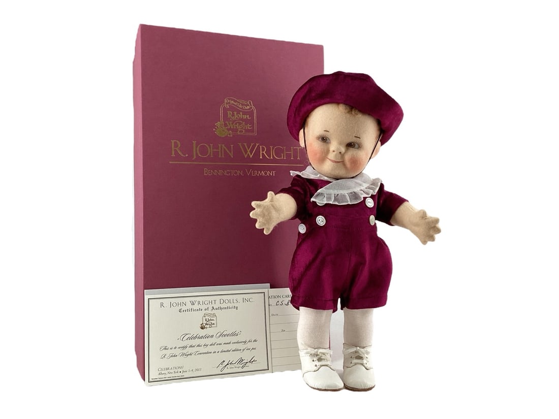R. John Wright Doll "Celebration Scootles" #CBS: R. John Wright Doll "Celebration Scootles" #CBSCelebration Scootles is 12.5" tall, fully jointed made of felt with hand painted features and molded hair. Wears suit of silk velveteen with organdy
