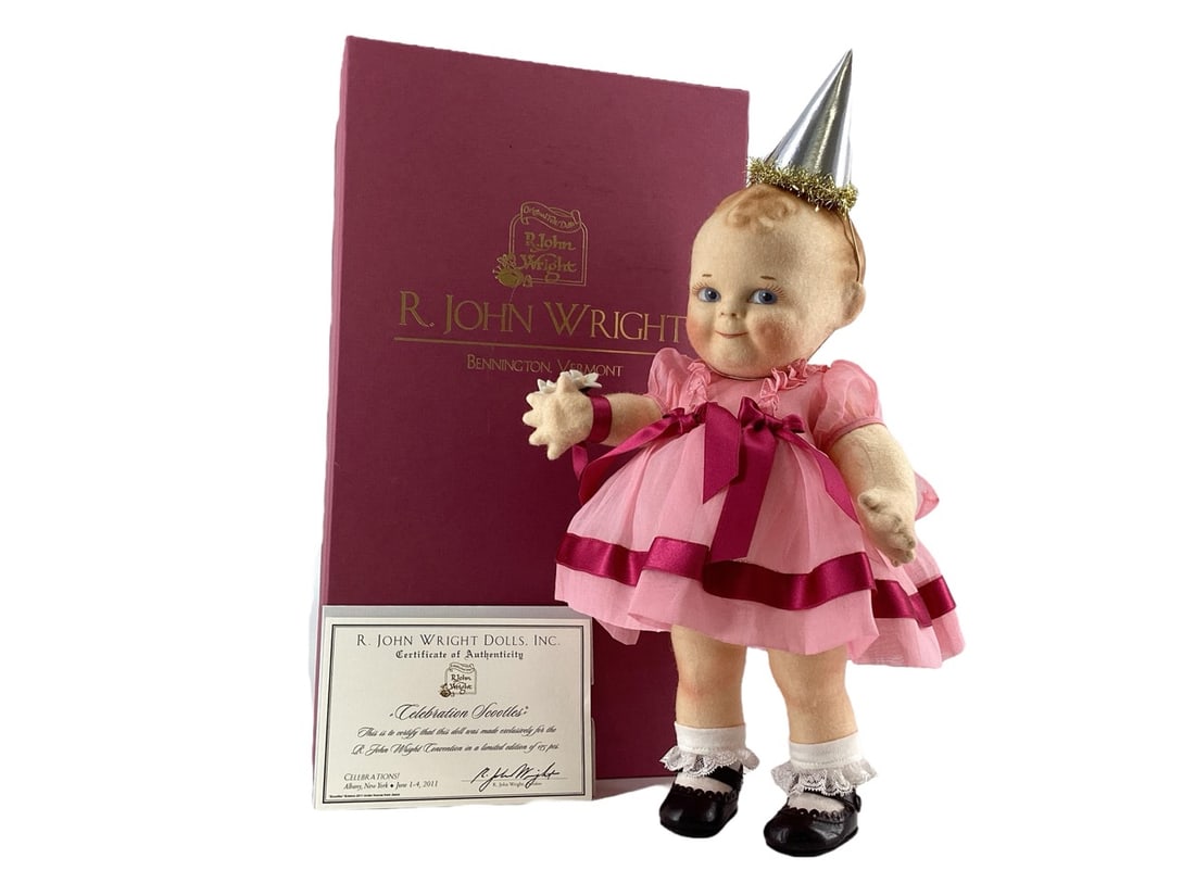 R. John Wright Doll "Celebration Scootles" #CBC: R. John Wright Doll "Celebration Scootles" #CBCIntroducing Celebration Scootles, a magnificent 12.5" tall doll radiating grace and charm. One of only 175 from a 2011 limited edition release for t