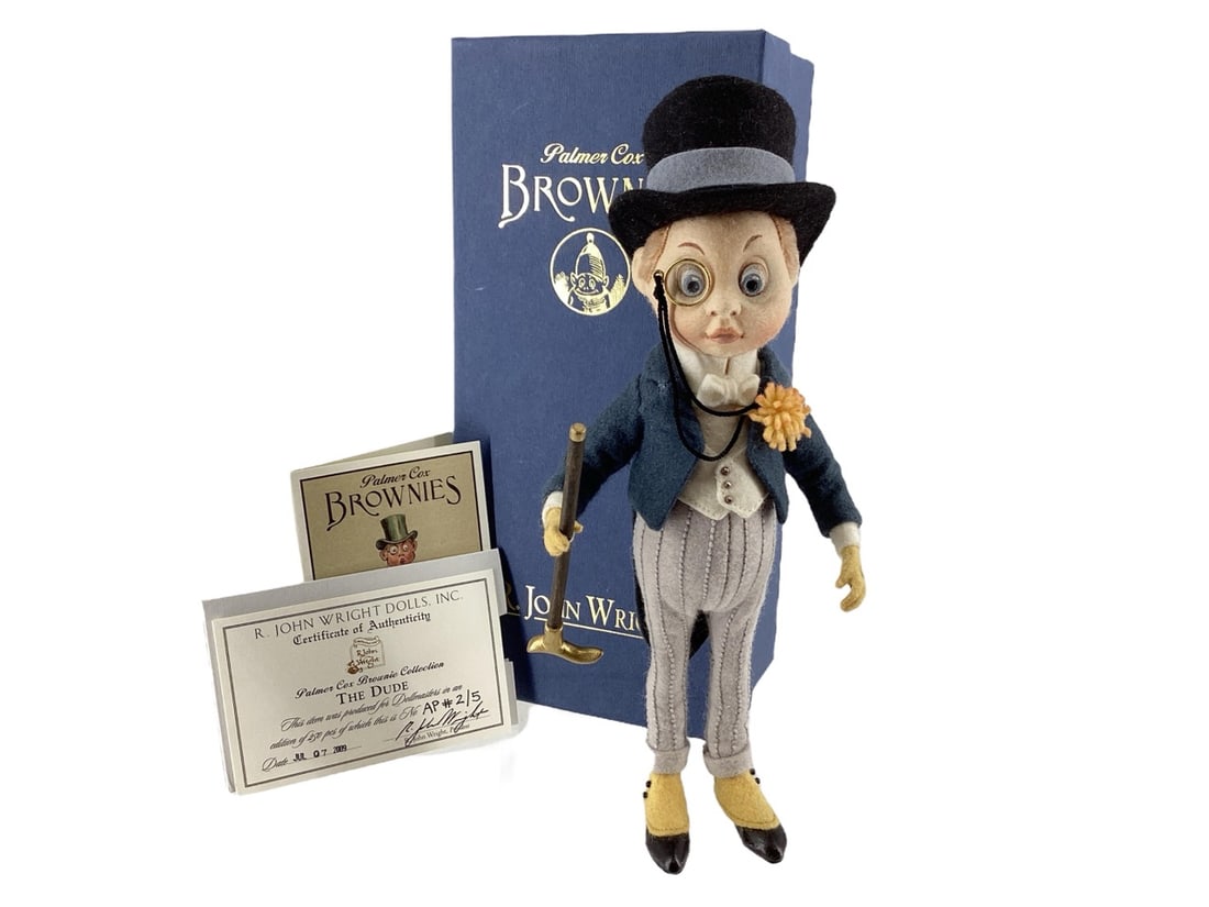 Palmer Cox Brownie "The Dude" Artist Proof AP#2/5 by R. John Wright Dolls with Signed Tag: Palmer Cox Brownie "The Dude" Artist Proof AP#2/5 by R. John Wright Dolls with Signed TagBased on the "Brownies" illustrations of Palmer Cox.Height: 9" (excluding hat); jointed at neck