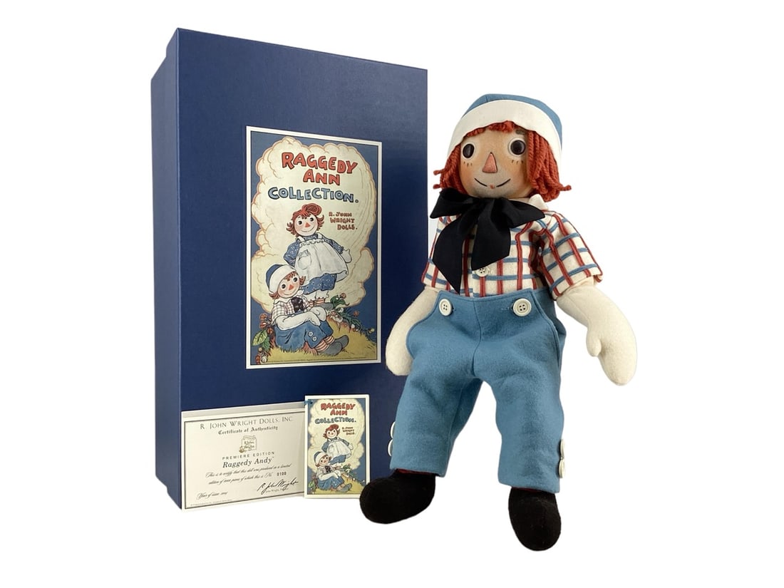 Premiere Edition "Raggedy Andy" #0100/1000 by R. John Wright Dolls: Premiere Edition "Raggedy Andy" #0100/1000 by R. John Wright DollsRaggedy Andy doll is authentic 17" Raggedy Ann character made of wool felt; jointed neck with floppy arms and legs; hand painted