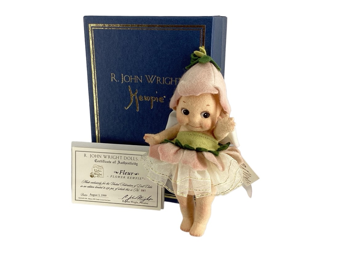 "Fleur" Flower Kewpie by R. John Wright #041/250 Signed: "Fleur" Flower Kewpie by R. John Wright #041/250 SignedMade exclusively for the 50th Anniversary of the United Federation of Doll Clubs. Dated August 3, 1999.