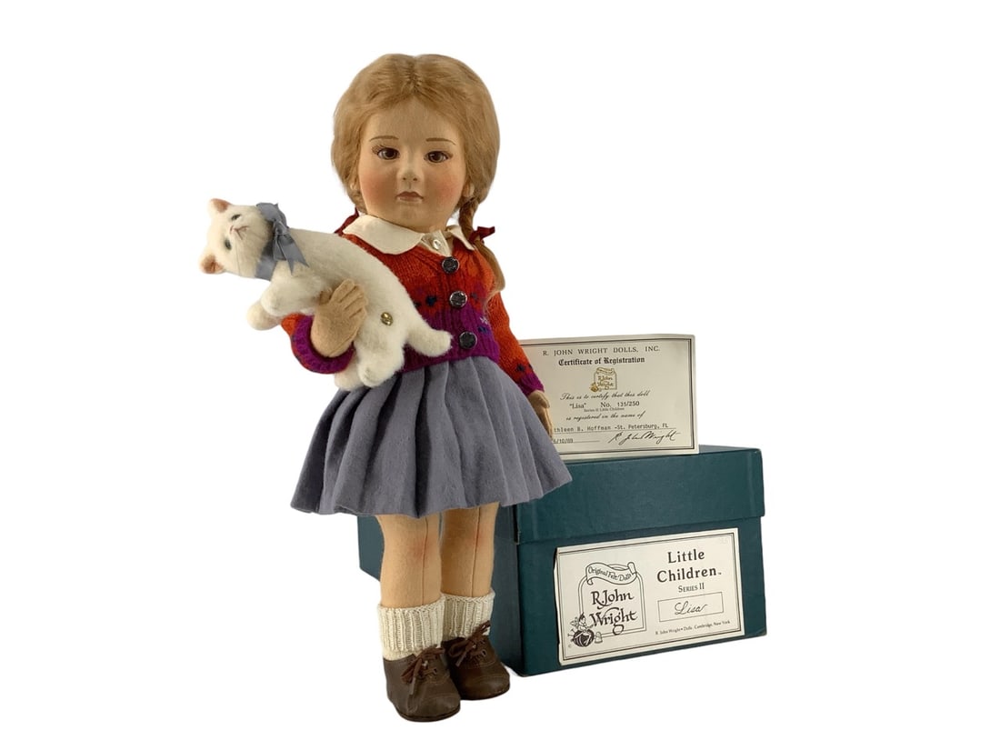 R. John Wright "Lisa" Doll #135 of 250.: R. John Wright "Lisa" Doll #135 of 250.Description; 16" tall, all felt, hand painted features, fully jointed and hand knotted human hair wig. Dressed in a felt and woven cotton costume holding mohair