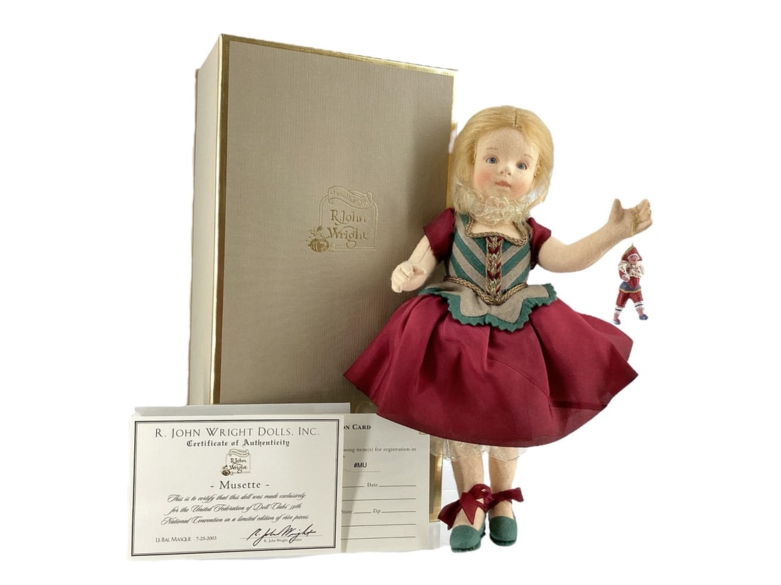 LeBal Masque "Musette" #MU by R. John Wright: LeBal Masque "Musette" #MU by R. John WrightMusetteDescription: 12" molded felt, fully jointed, hand painted features, mohair wig. Felt and silk costume. Comes apart at the waist to reveal a silk