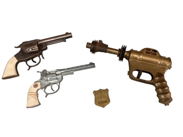 Toy Pistols and Deputy Badge